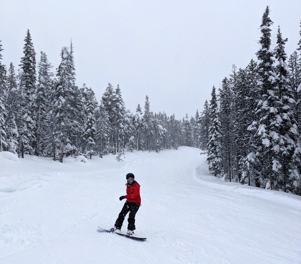 gemma snowboarding down a ski hill